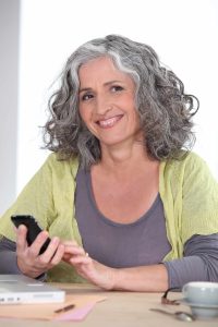 Older woman using a mobile phone